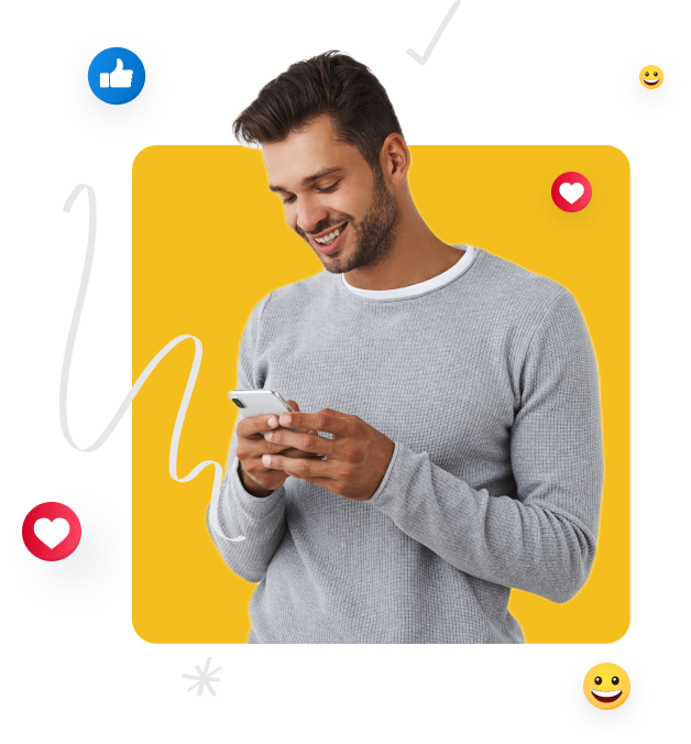 Smiling man in grey sweater checking phone with social media engagement icons around him.