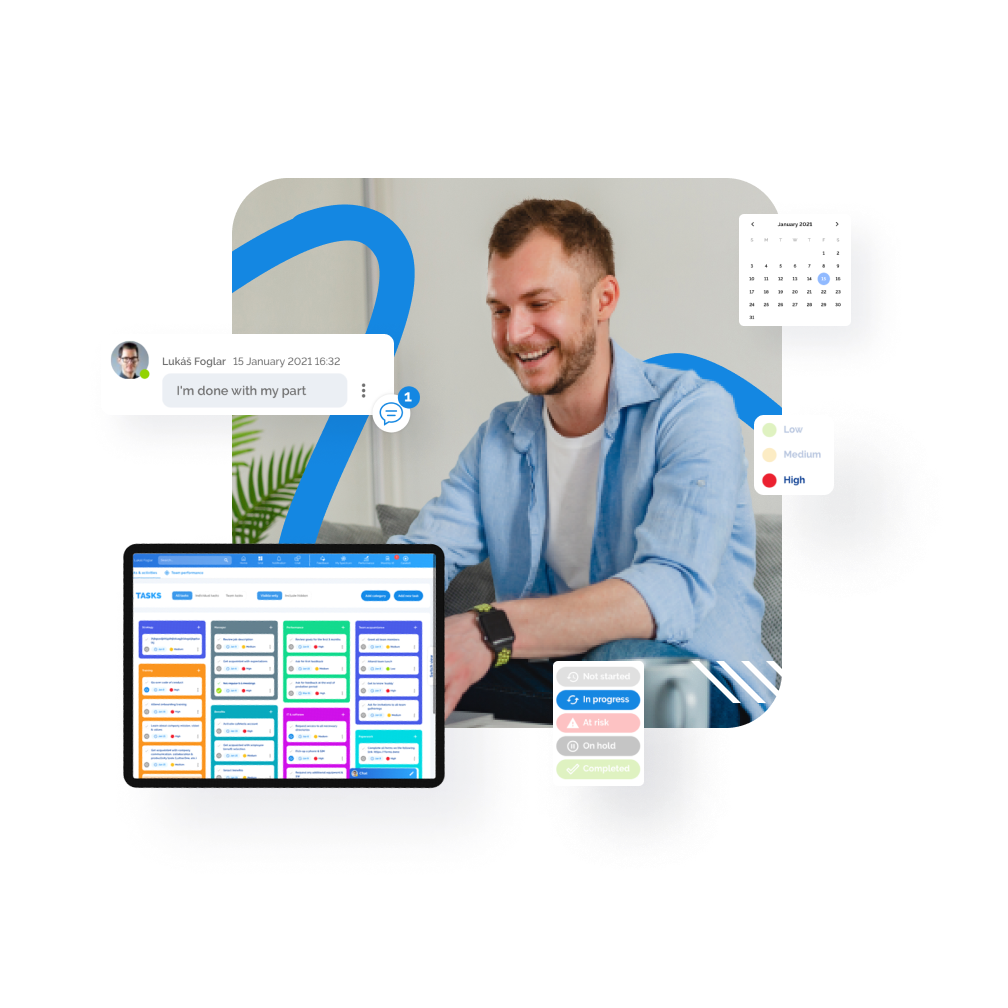 Smiling man viewing a laptop with a colorful scheduling interface, surrounded by digital communication tools.